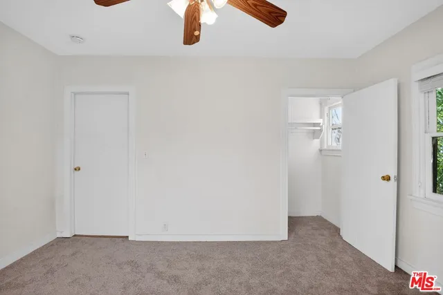 an empty room with window