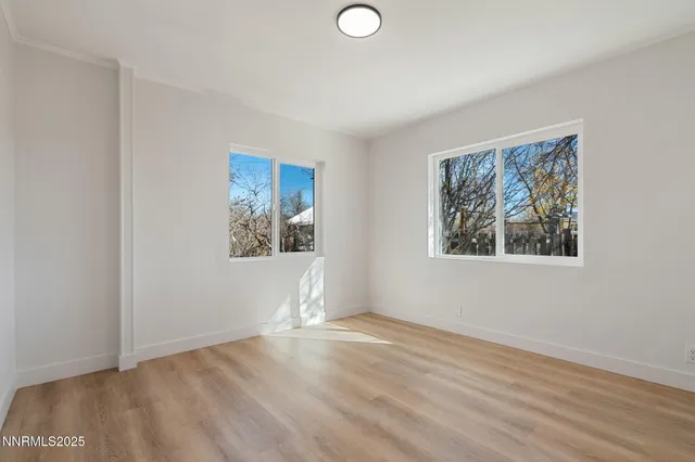 a view of a house with a snow in the yard