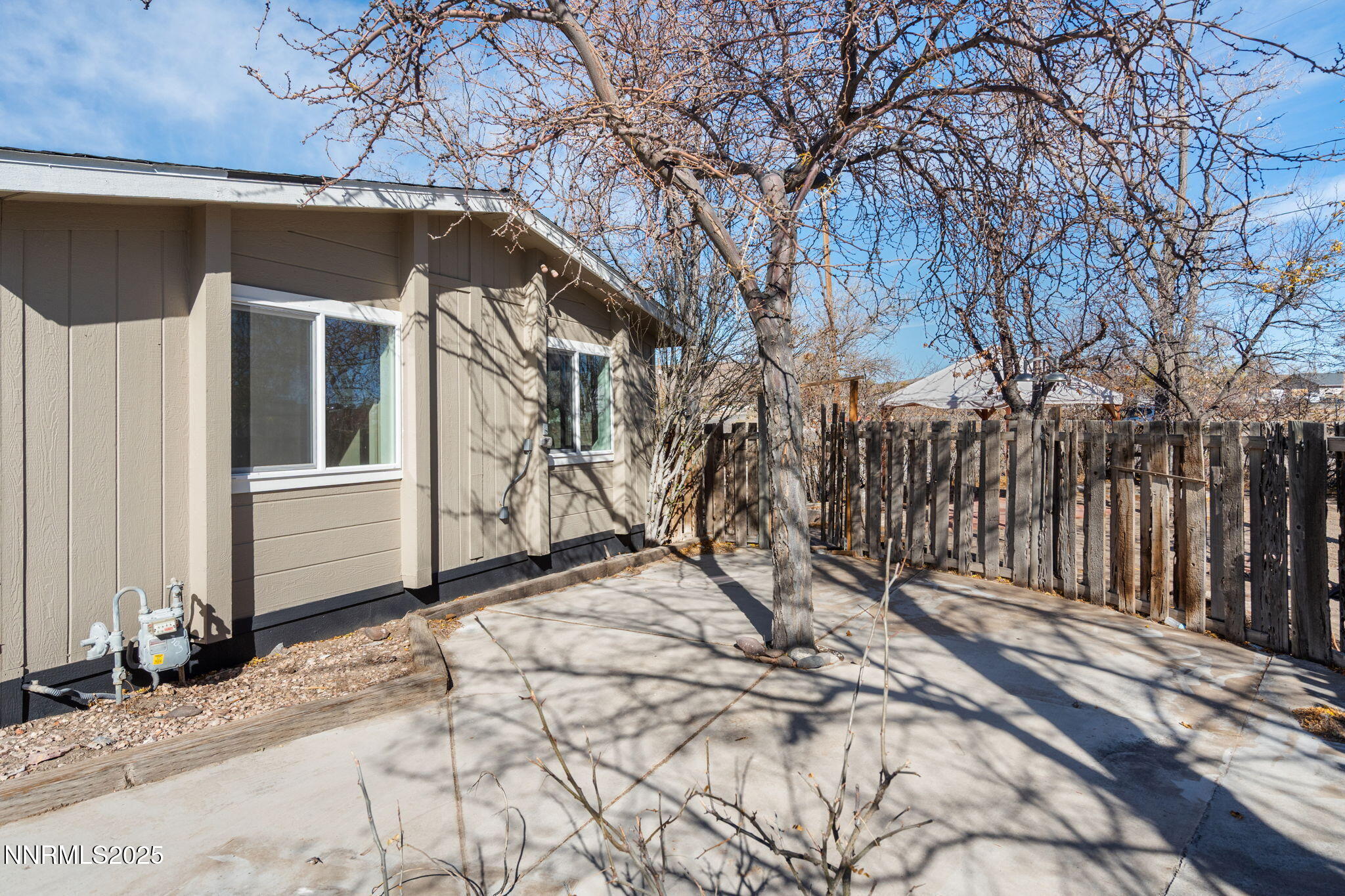 4925 Cheyenne Trail Silver Springs, NV 89429 - Photo 21 of 35 a view of a house with a snow in the yard