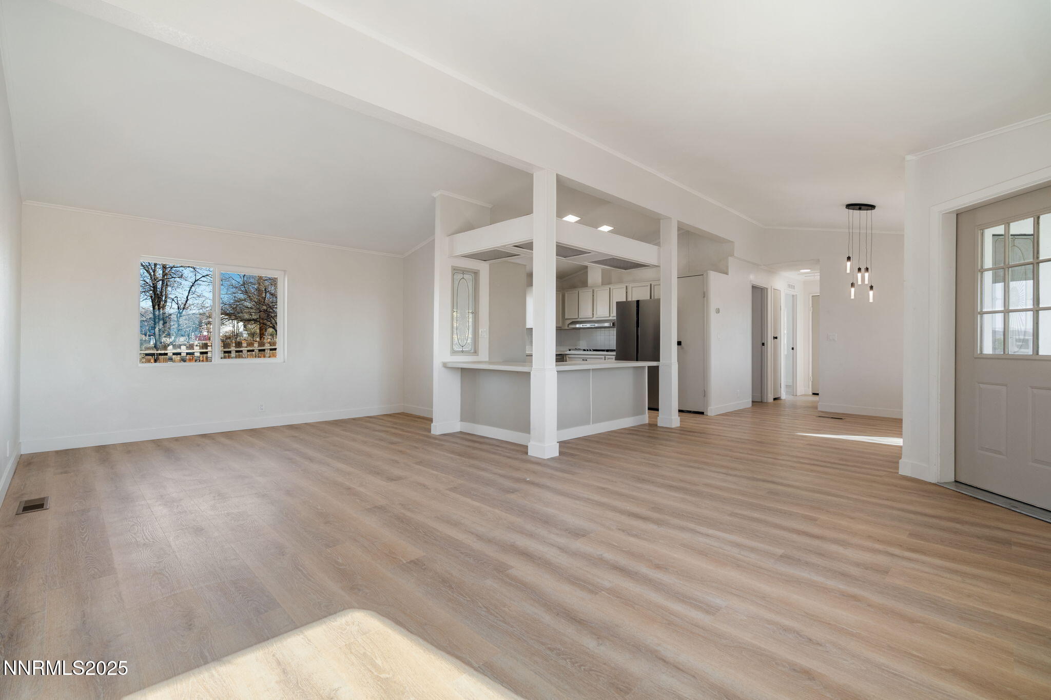 4925 Cheyenne Trail Silver Springs, NV 89429 - Photo 8 of 35 a view of empty room with wooden floor