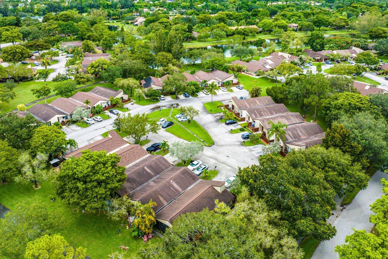 22543 Vistawood Way Boca Raton, FL 33428 - Photo 30 of 32 an aerial view of residential house with outdoor space and trees all around