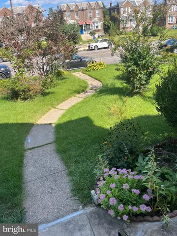 a view of a garden with a lake view