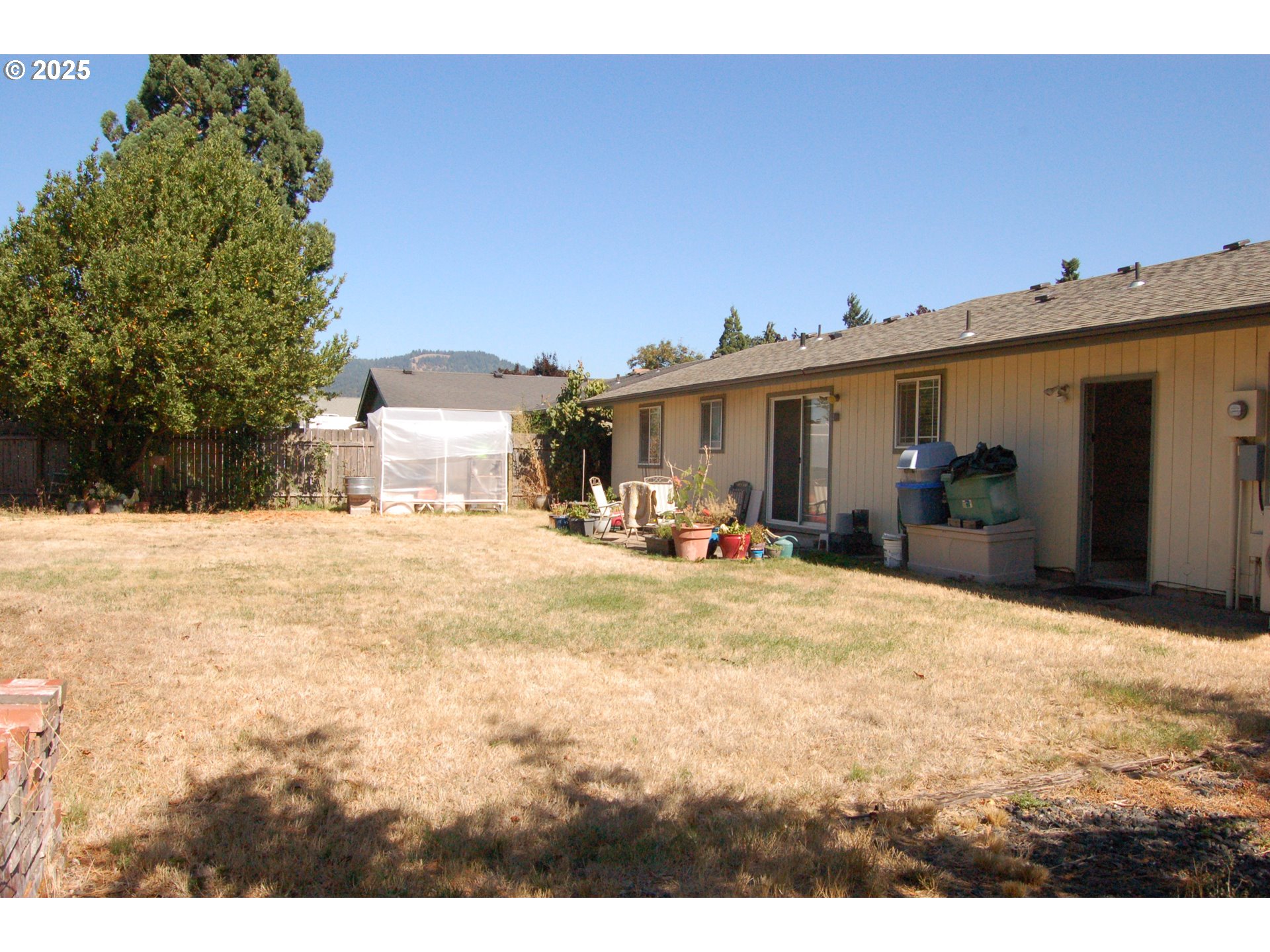 2252 Rose Blossom Drive Springfield, OR 97477 - Photo 15 of 26 a view of a house with a yard