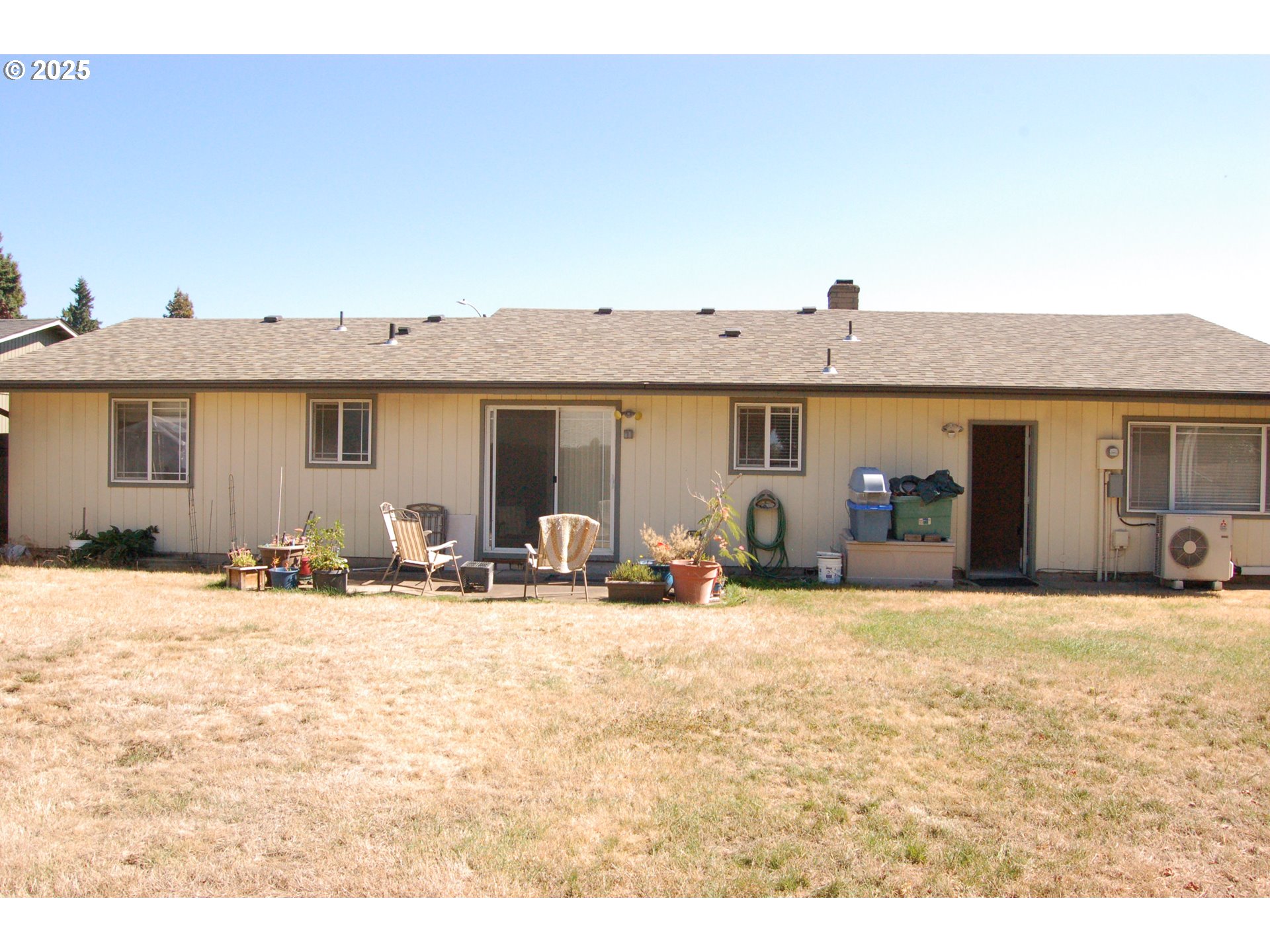 2252 Rose Blossom Drive Springfield, OR 97477 - Photo 19 of 26 a view of a house with a patio