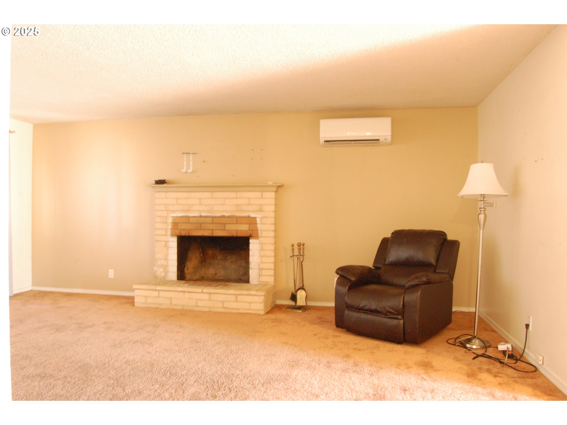 2252 Rose Blossom Drive Springfield, OR 97477 - Photo 5 of 26 a living room with furniture and a fireplace