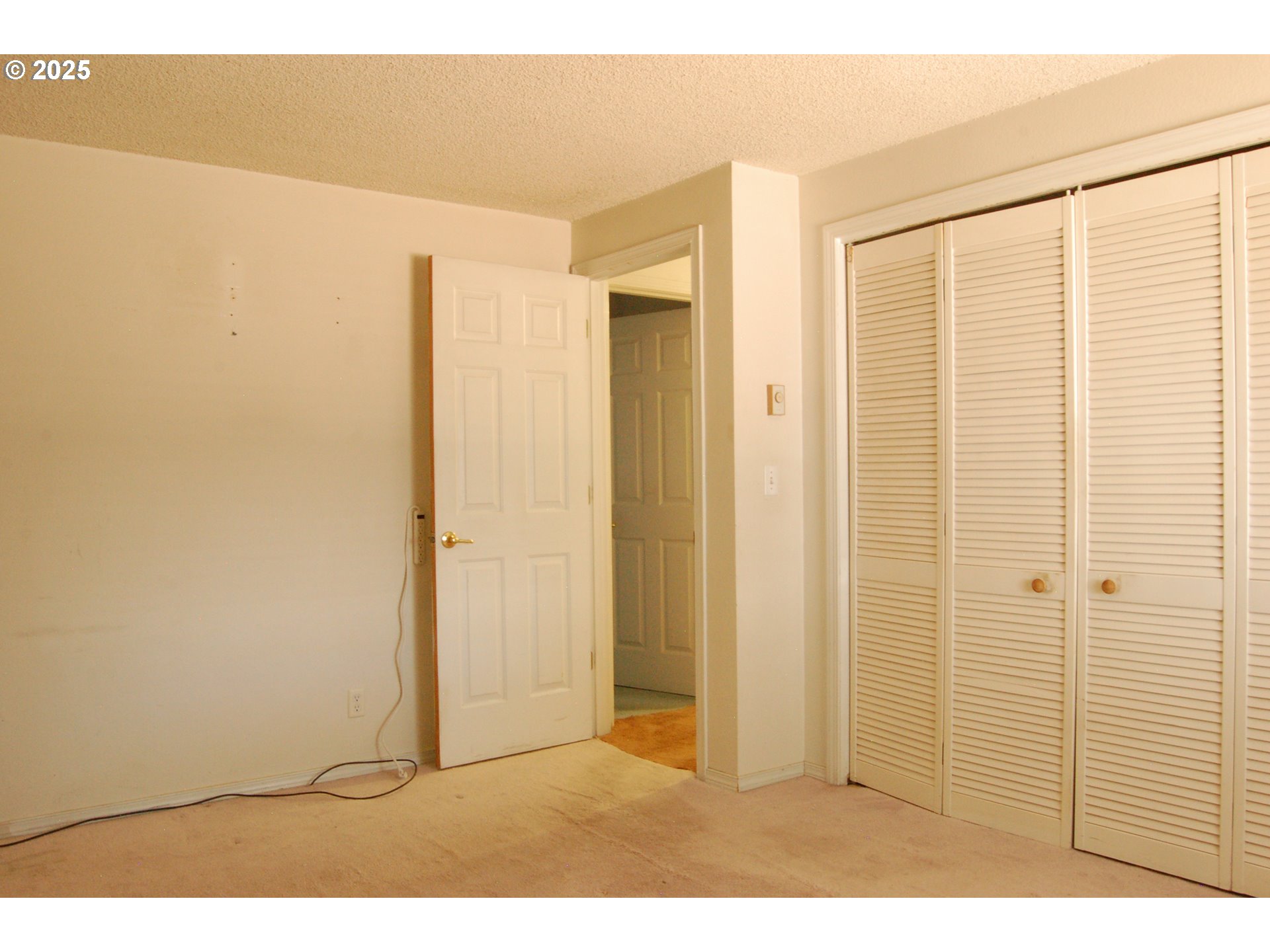 2252 Rose Blossom Drive Springfield, OR 97477 - Photo 6 of 26 a view of an empty room with wooden floor