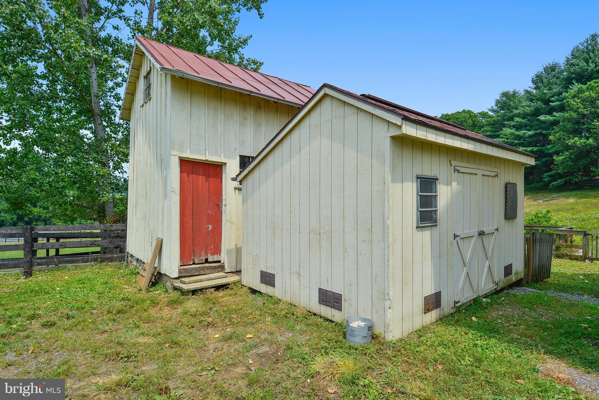 20852 St Louis Road Middleburg, VA 20117 - Photo 5 of 29 a view of backyard with deck and garden