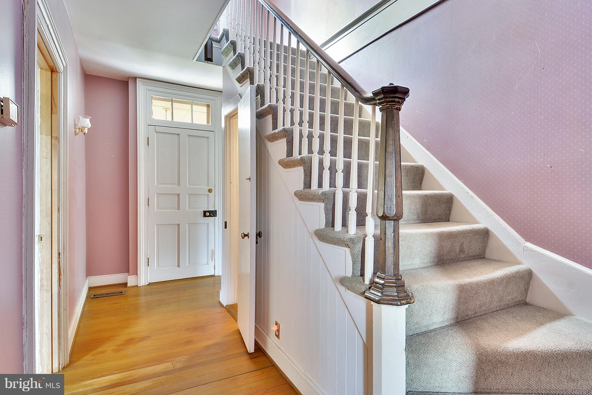 20852 St Louis Road Middleburg, VA 20117 - Photo 9 of 29 a view of entryway and hall with wooden floor