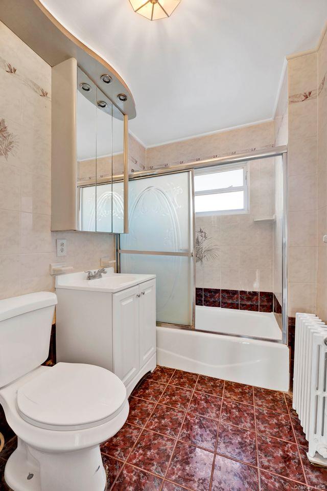 102-12 62nd Road Queens, NY 11375 - Photo 17 of 27 a bathroom with a toilet and a shower