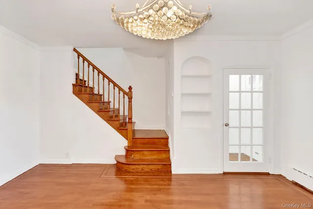 a view of entryway with wooden floor