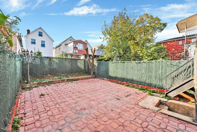 a street view with a bench in front of it