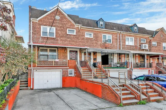 a front view of a house with swimming pool