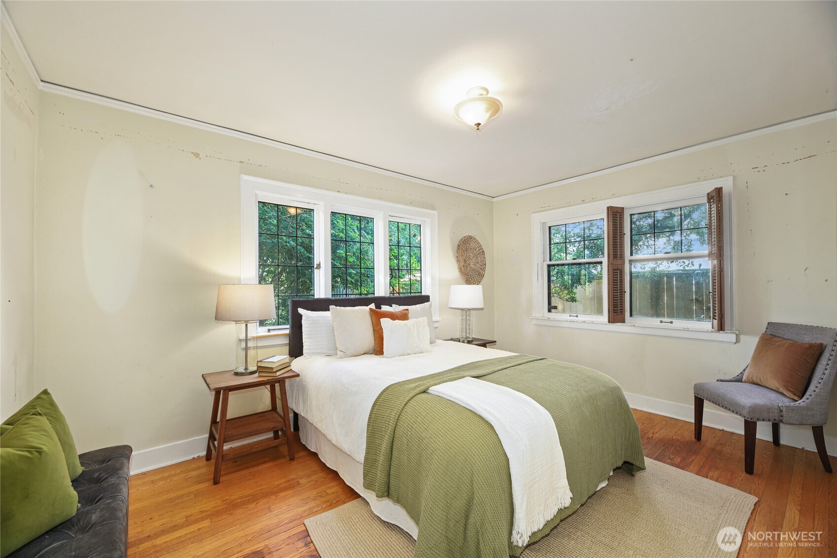 2309 Arch Avenue Southwest Seattle, WA 98116 - Photo 18 of 40 a bedroom with a bed and a window
