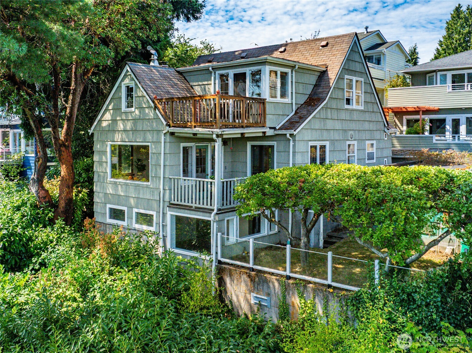 2309 Arch Avenue Southwest Seattle, WA 98116 - Photo 2 of 40 front view of house with a yard and potted plants