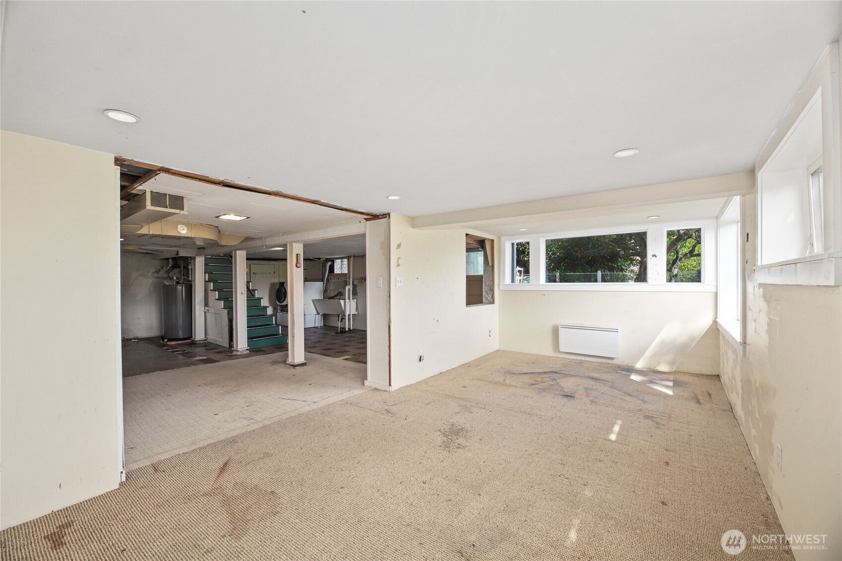 2309 Arch Avenue Southwest Seattle, WA 98116 - Photo 33 of 40 a view of a big room with windows and cabinet