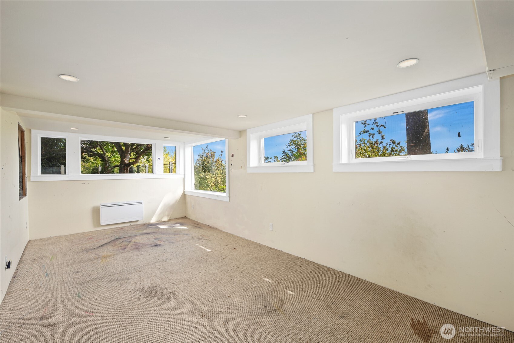 2309 Arch Avenue Southwest Seattle, WA 98116 - Photo 34 of 40 a view of an empty room with a window
