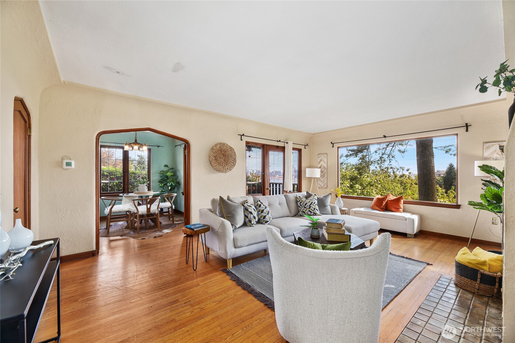 2309 Arch Avenue Southwest Seattle, WA 98116 - Photo 5 of 40 a living room with furniture and a large window