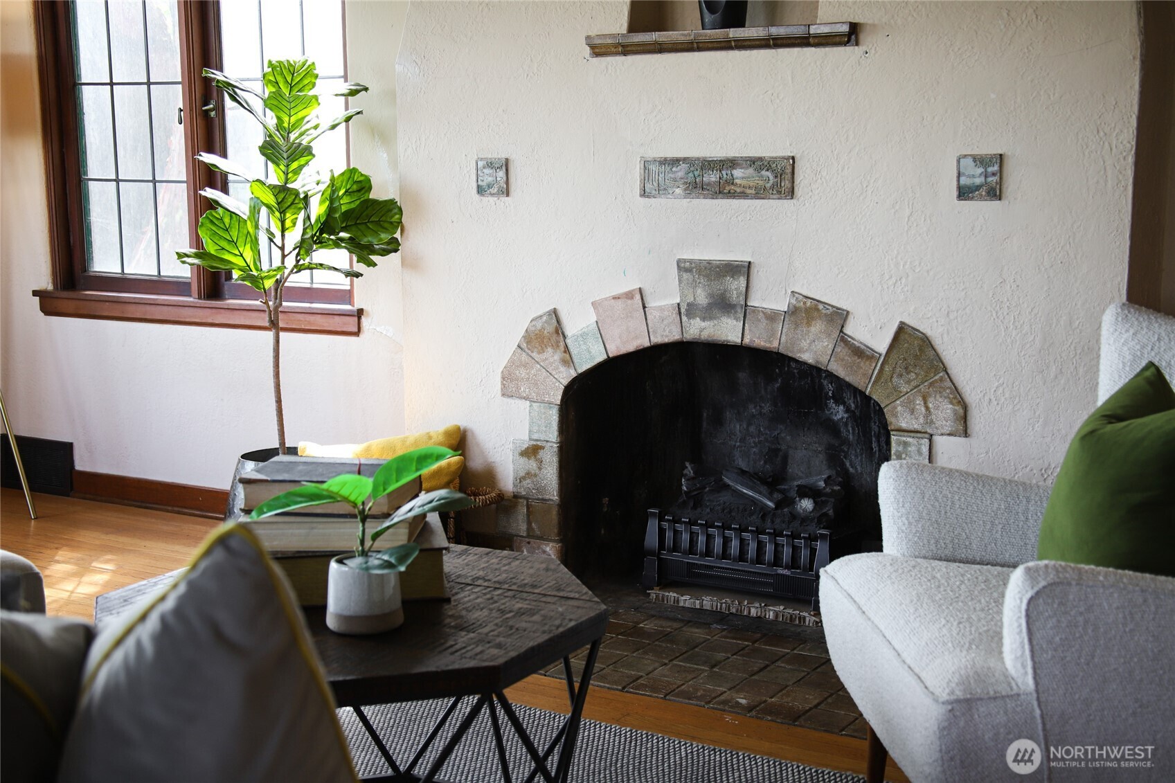 2309 Arch Avenue Southwest Seattle, WA 98116 - Photo 7 of 40 a living room with furniture and a potted plant
