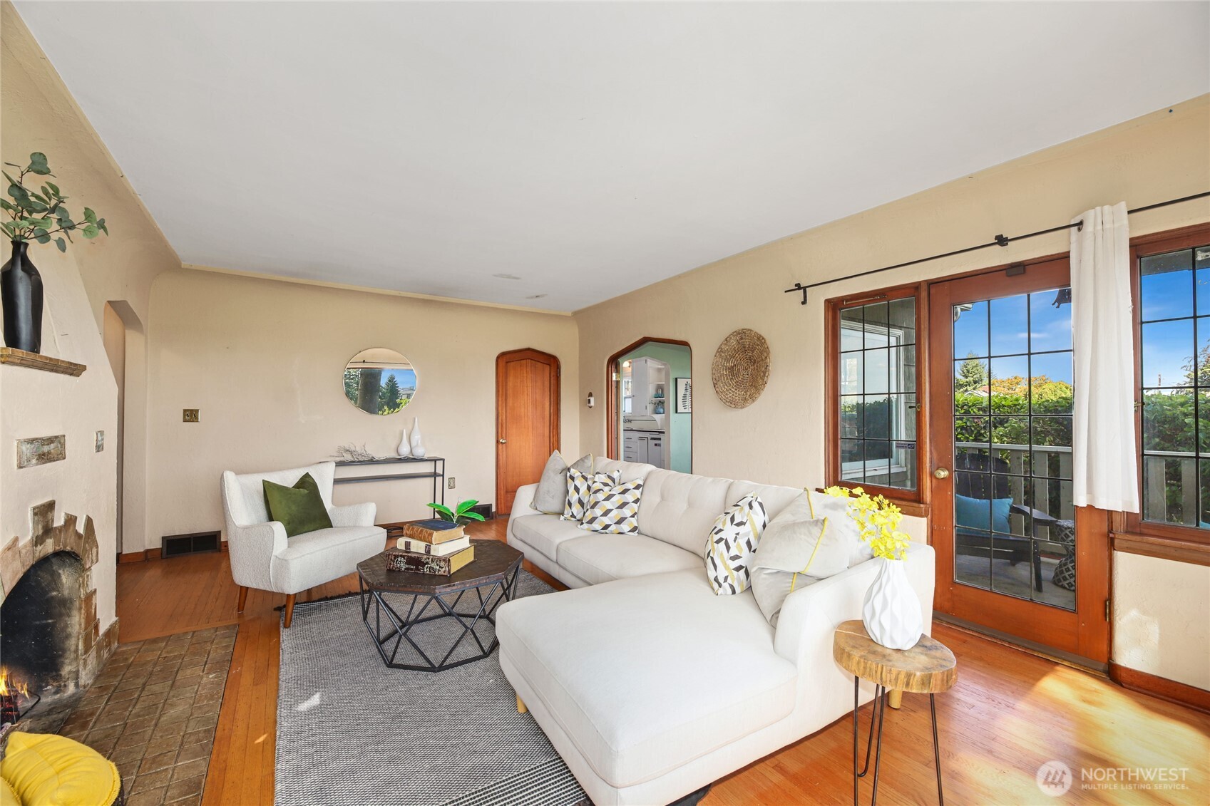 2309 Arch Avenue Southwest Seattle, WA 98116 - Photo 9 of 40 a living room with furniture and a large window