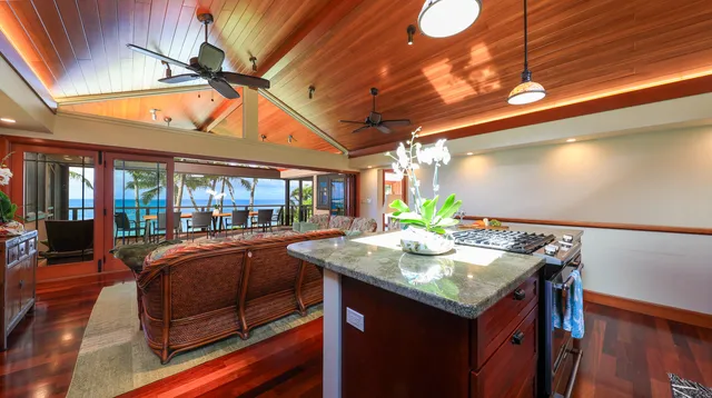 a kitchen with a sink and a stove
