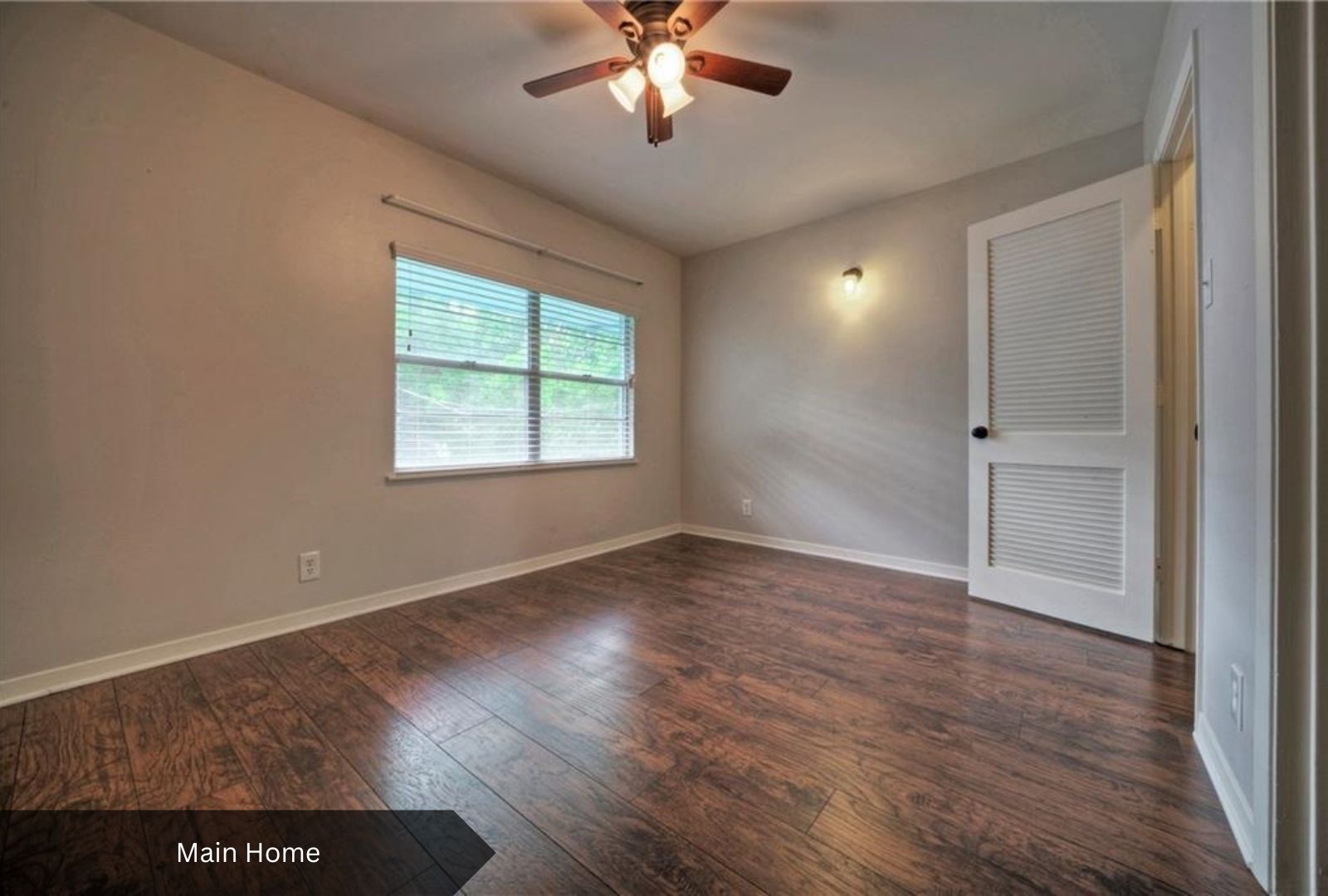 0 Rabb Road Austin, TX 78704 - Photo 17 of 39 an empty room with wooden floor chandelier and windows