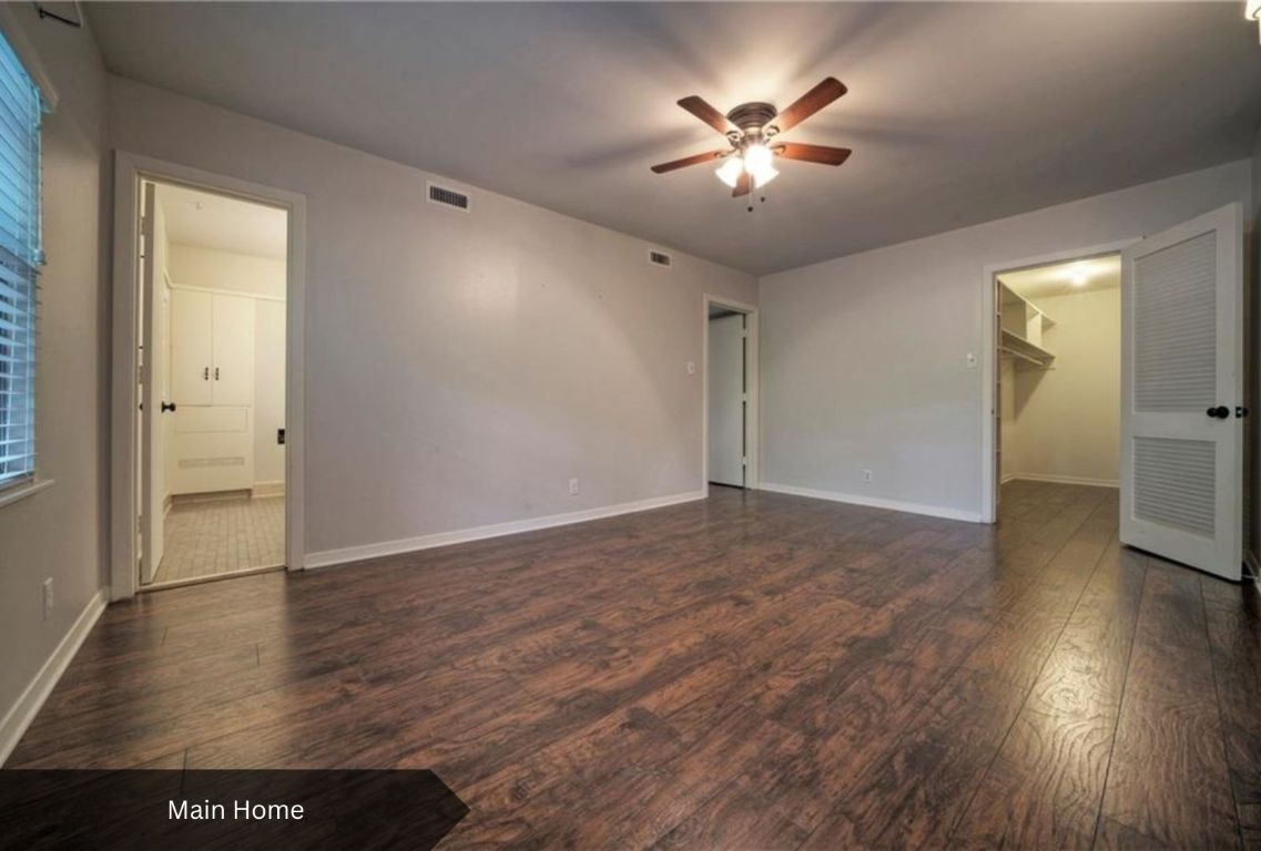 0 Rabb Road Austin, TX 78704 - Photo 18 of 39 an empty room with wooden floor and a ceiling fan