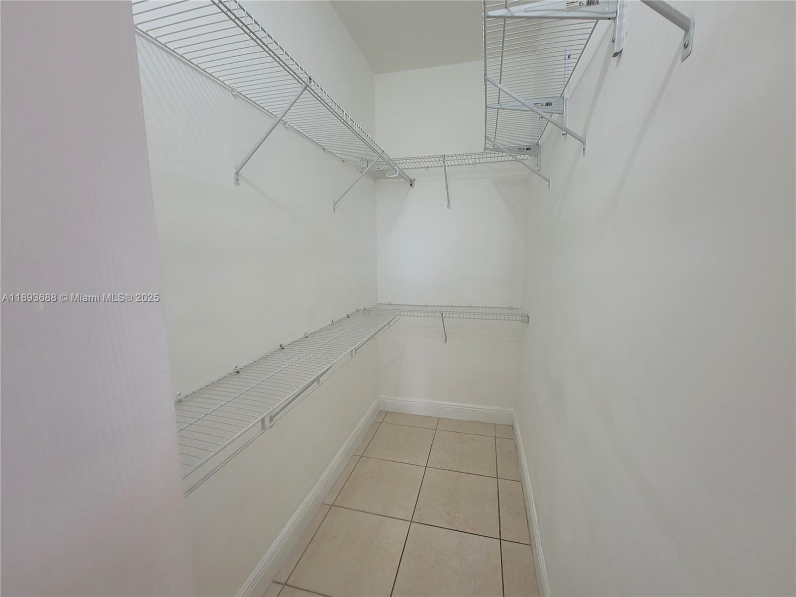 5271 Southwest 8th Street, Unit 411 Miami, FL 33134 - Photo 8 of 12 a view of a room