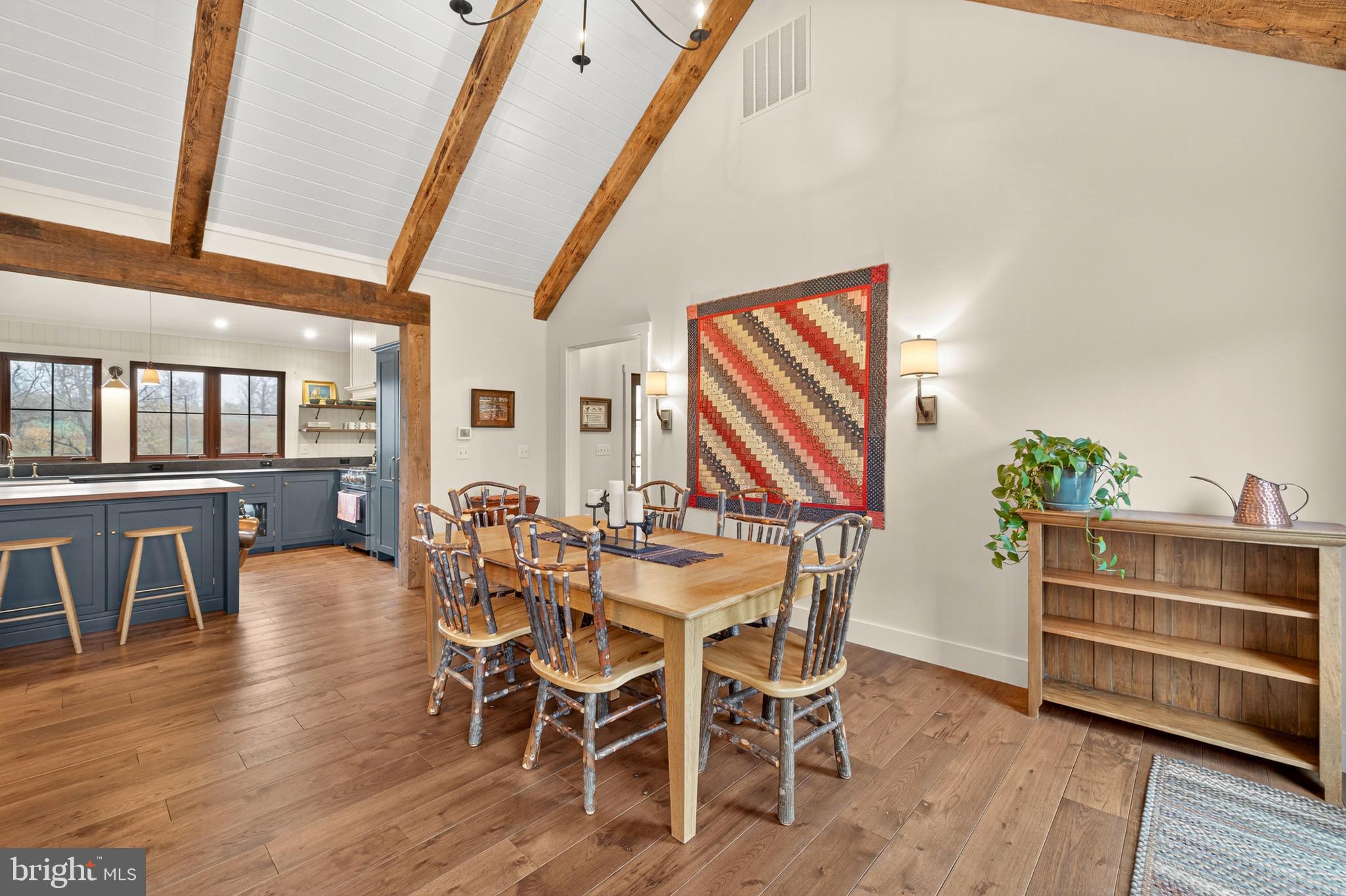63 Riley Hollow Road Huntly, VA 22640 - Photo 15 of 92 a view of a dining room with furniture and wooden floor