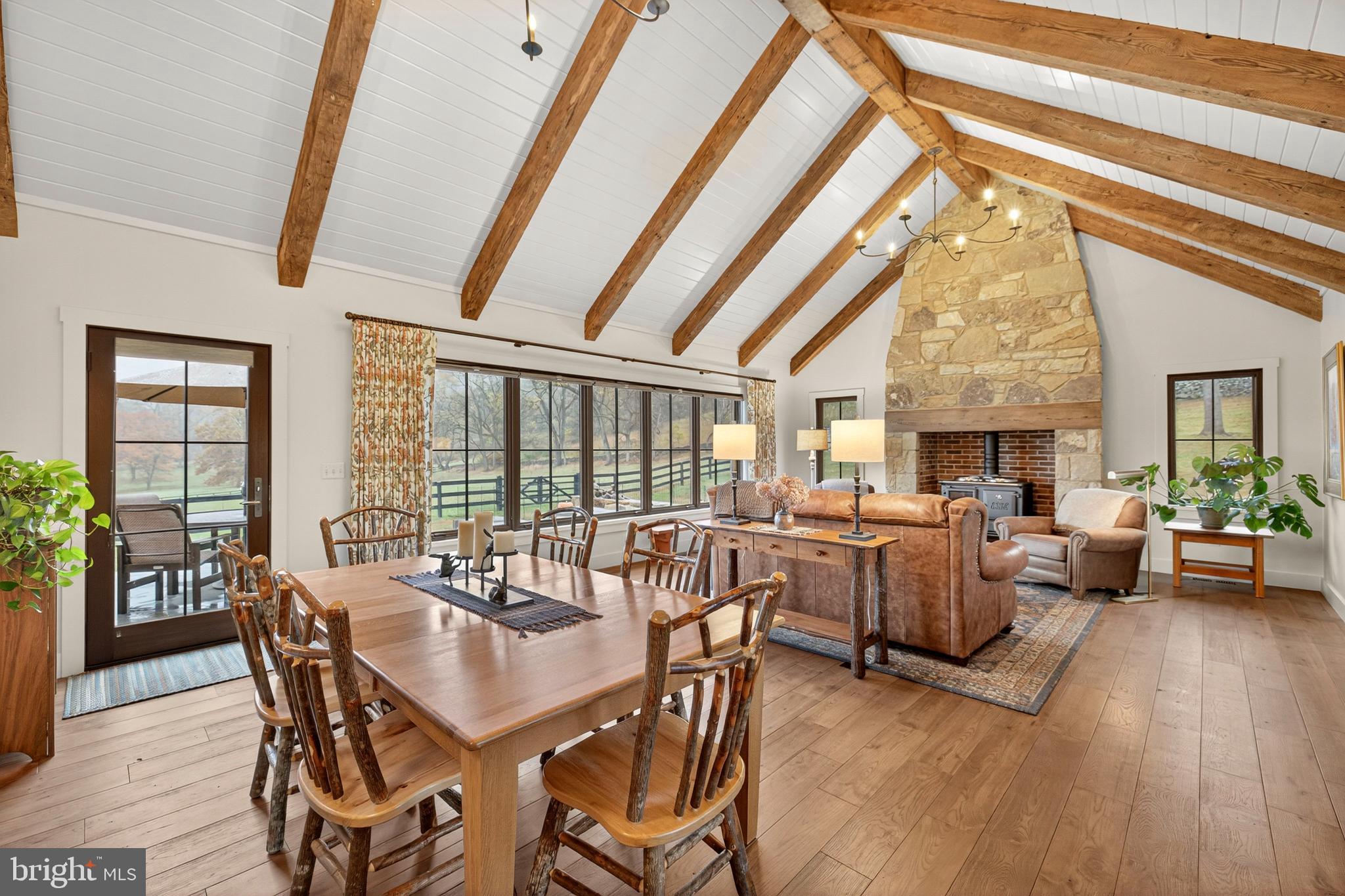 63 Riley Hollow Road Huntly, VA 22640 - Photo 17 of 92 a view of a dining room with furniture window and wooden floor