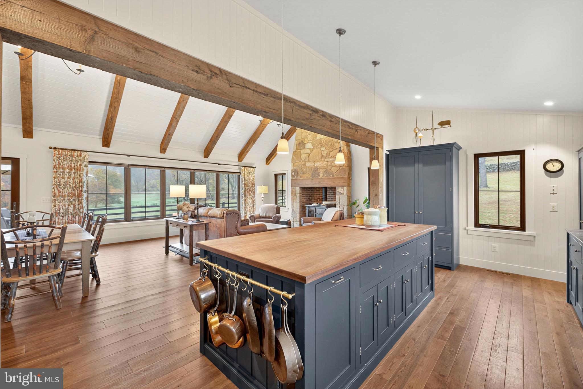 63 Riley Hollow Road Huntly, VA 22640 - Photo 18 of 92 a dining hall with stainless steel appliances granite countertop a stove and chairs with wooden floor