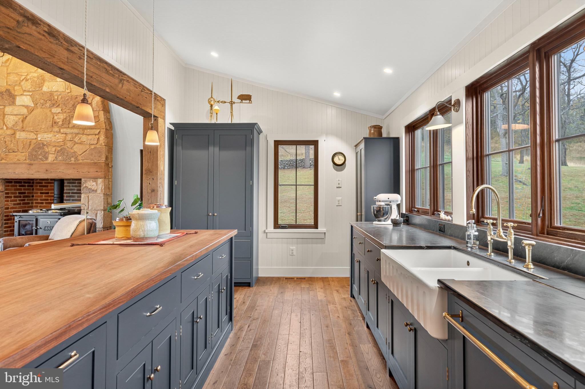 63 Riley Hollow Road Huntly, VA 22640 - Photo 19 of 92 a kitchen with stainless steel appliances granite countertop a sink stove and cabinets