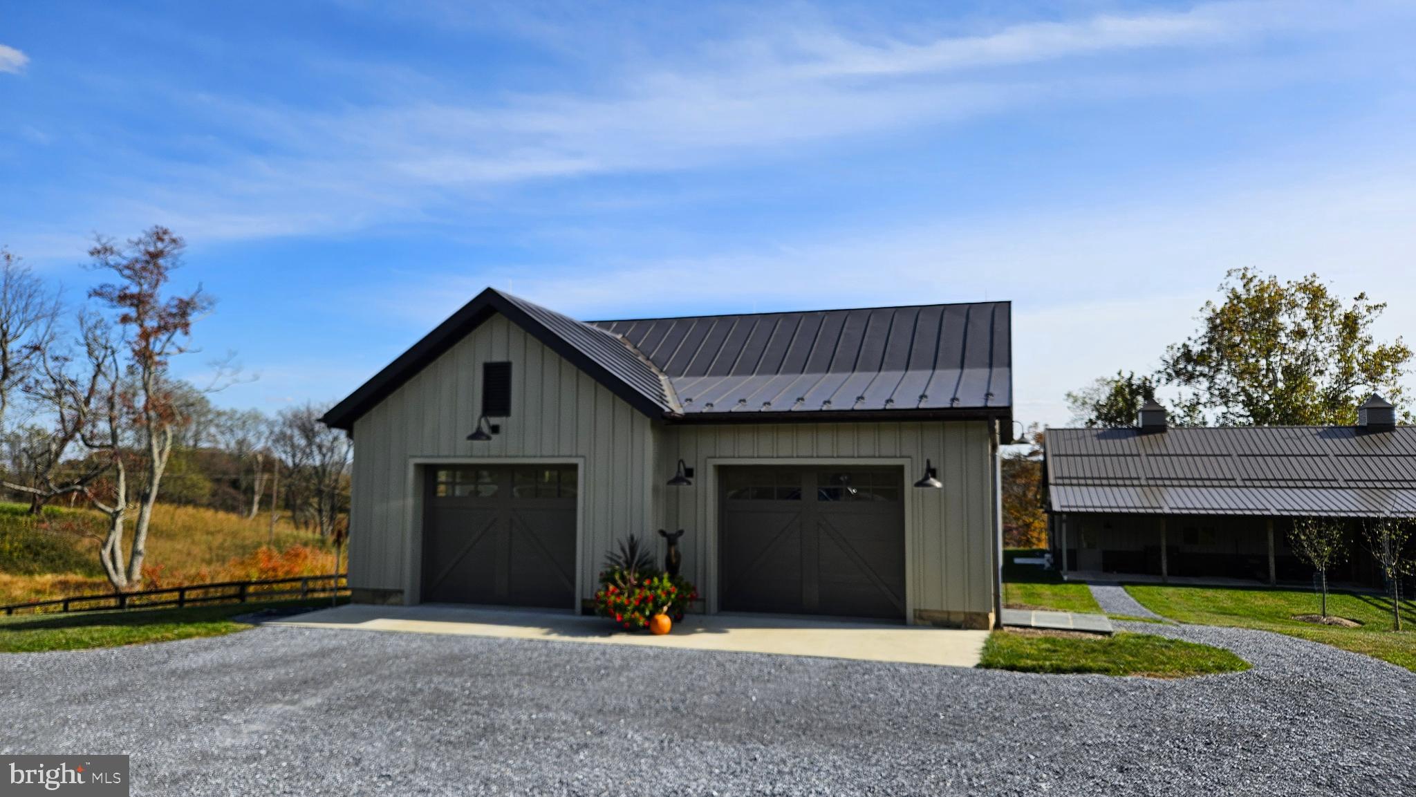 63 Riley Hollow Road Huntly, VA 22640 - Photo 42 of 92 a view of a house with a patio and a yard