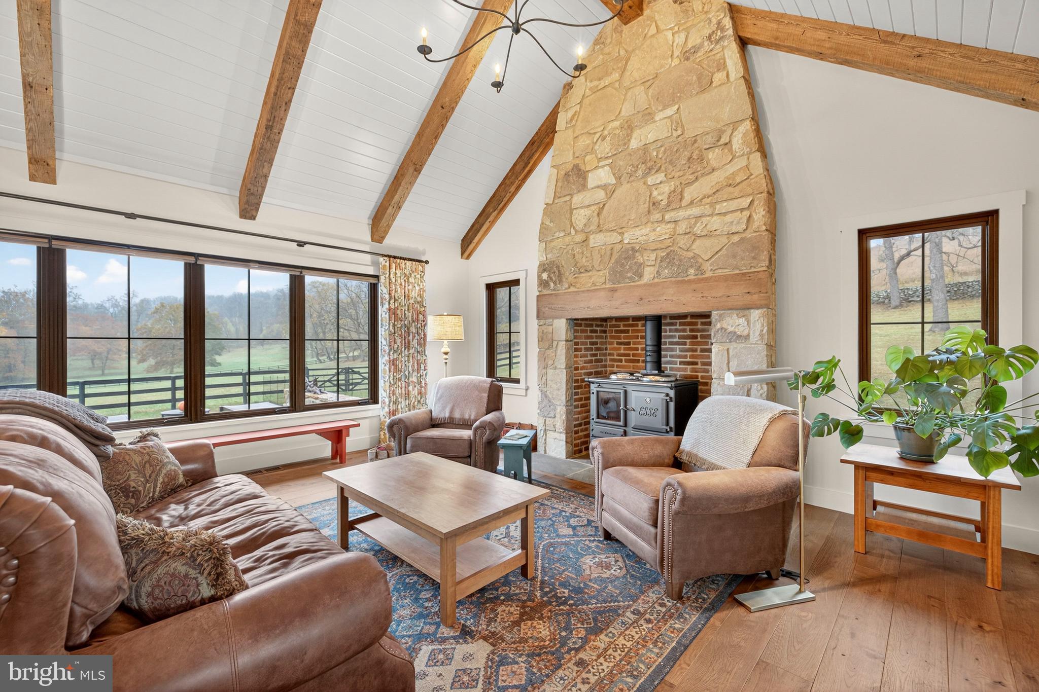 63 Riley Hollow Road Huntly, VA 22640 - Photo 7 of 92 a living room with furniture and a large window