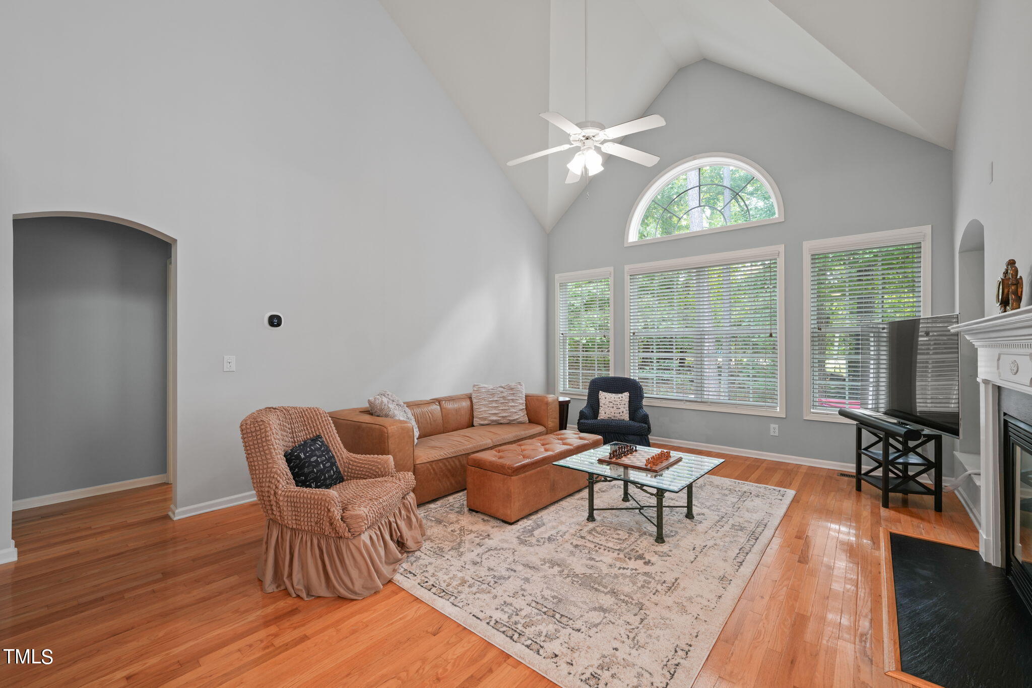 3 Piney Park Lane Durham, NC 27713 - Photo 11 of 47 a living room with furniture and a large window