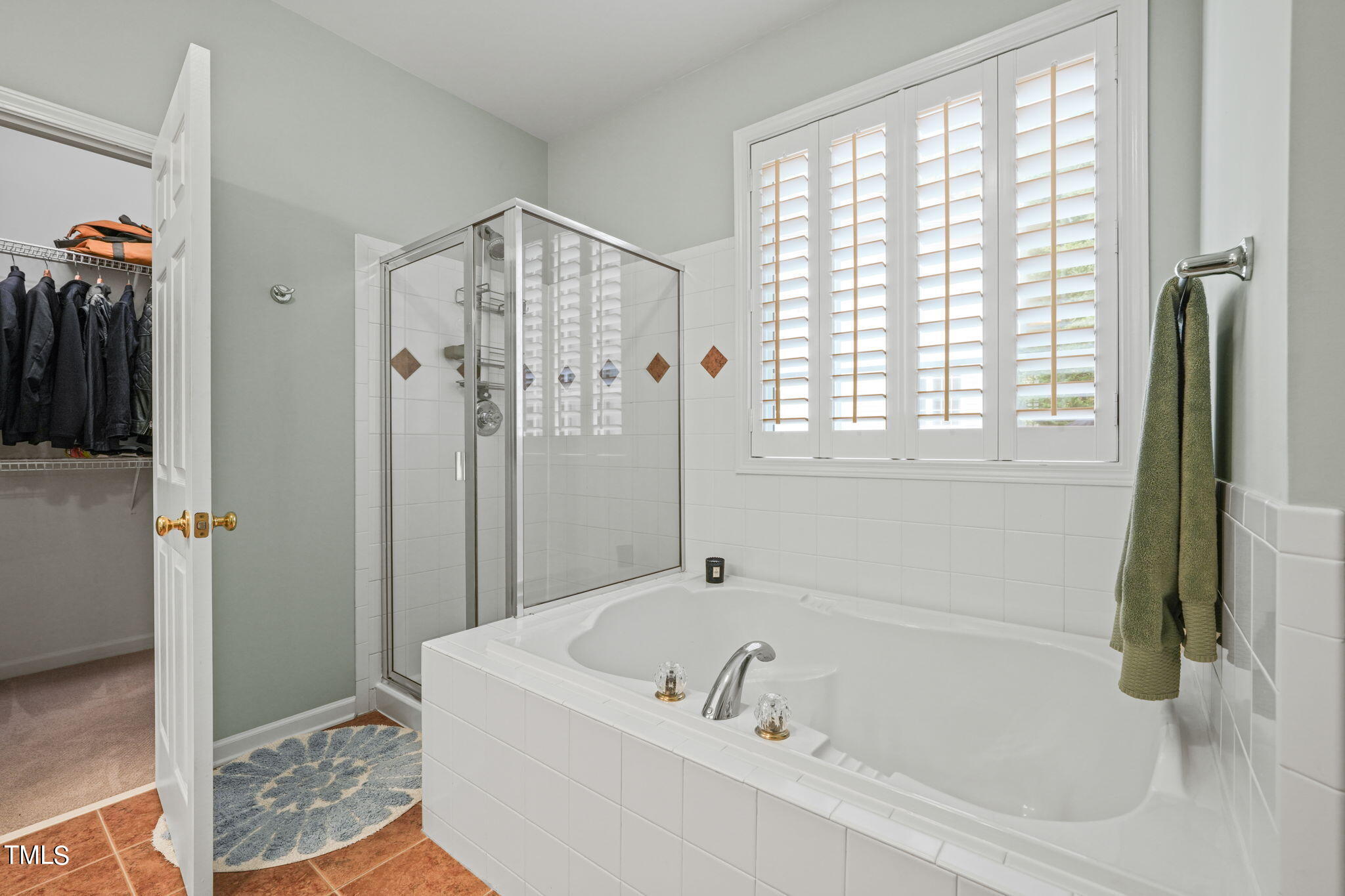 3 Piney Park Lane Durham, NC 27713 - Photo 23 of 47 a bathroom with a bathtub and a shower