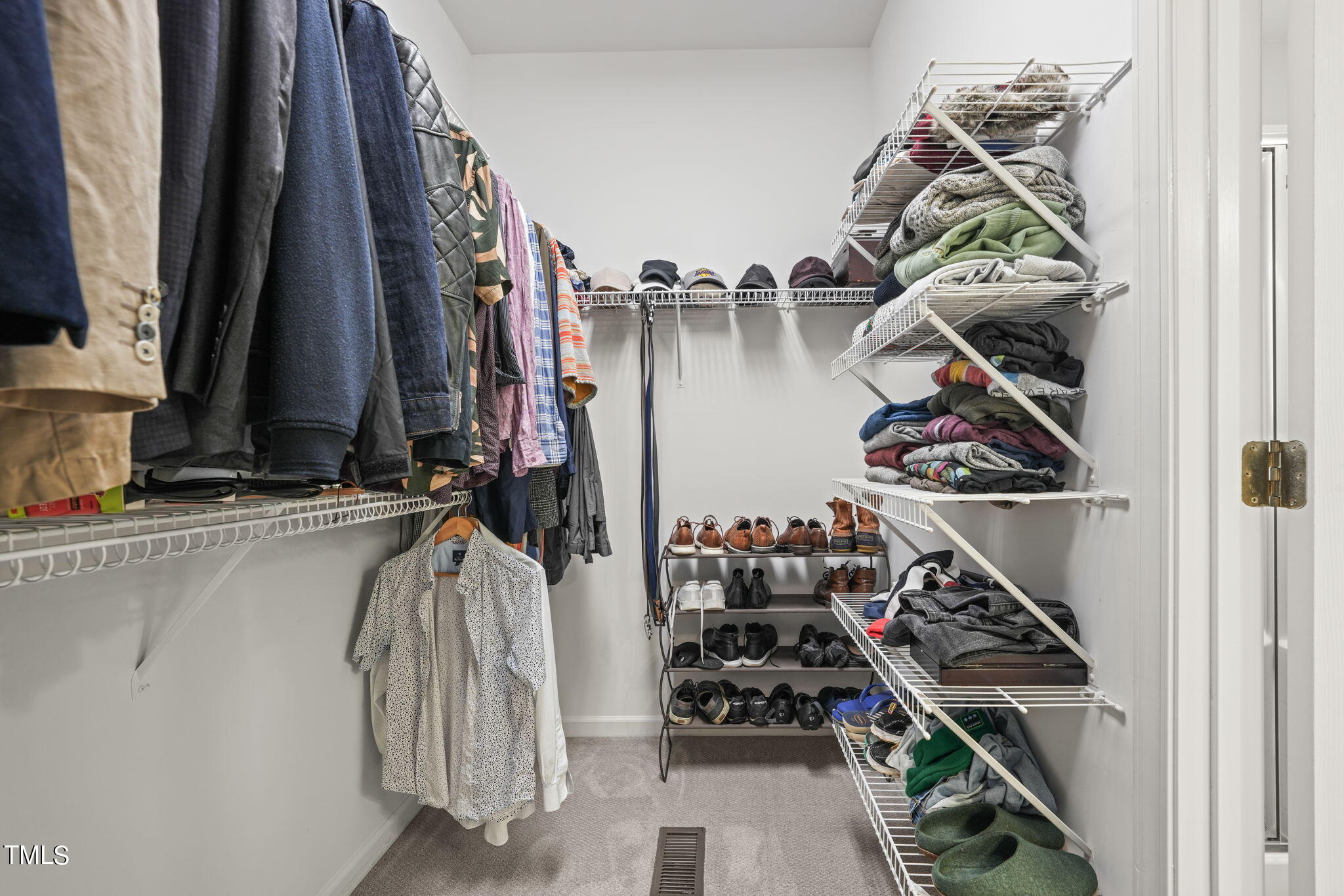 3 Piney Park Lane Durham, NC 27713 - Photo 24 of 47 a view of walk in closet with clothes and shoes