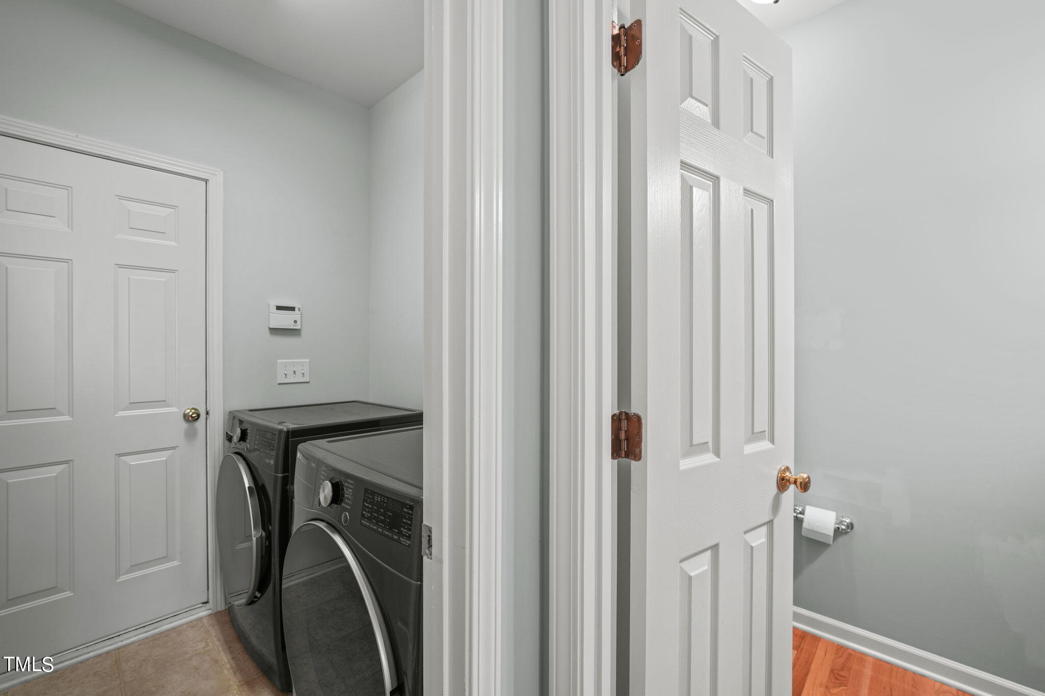 3 Piney Park Lane Durham, NC 27713 - Photo 26 of 47 a view of a bathroom from a hallway