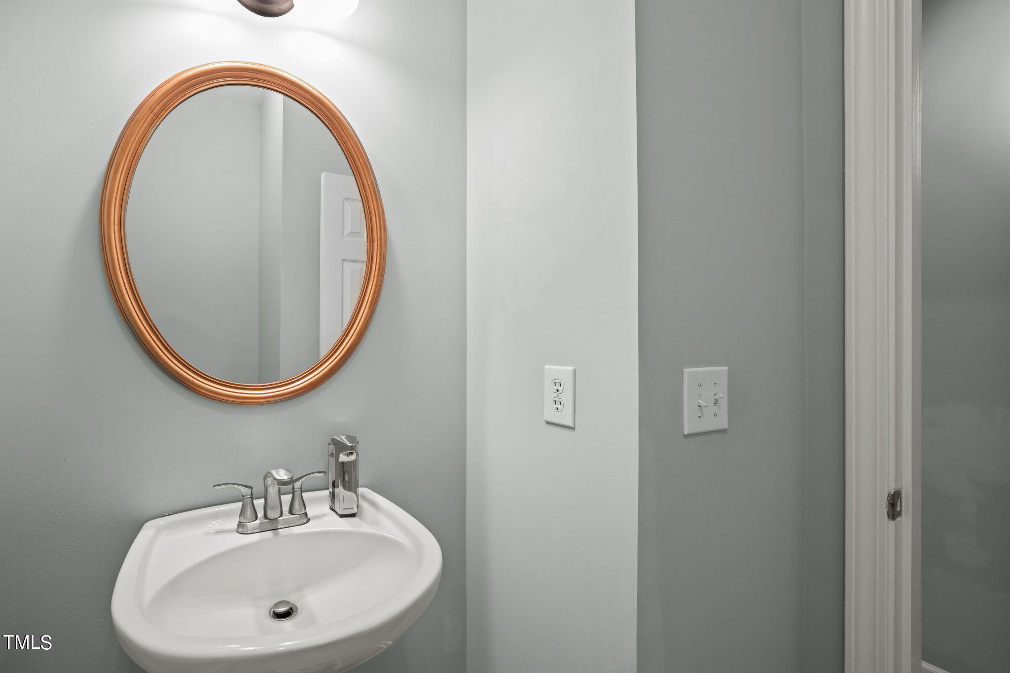 3 Piney Park Lane Durham, NC 27713 - Photo 27 of 47 a bathroom with a sink and a mirror