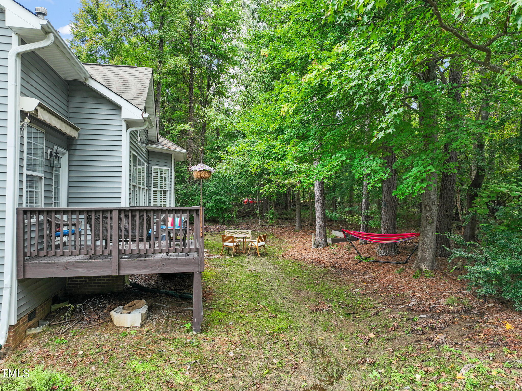 3 Piney Park Lane Durham, NC 27713 - Photo 41 of 47 a view of a chair and table in the backyard