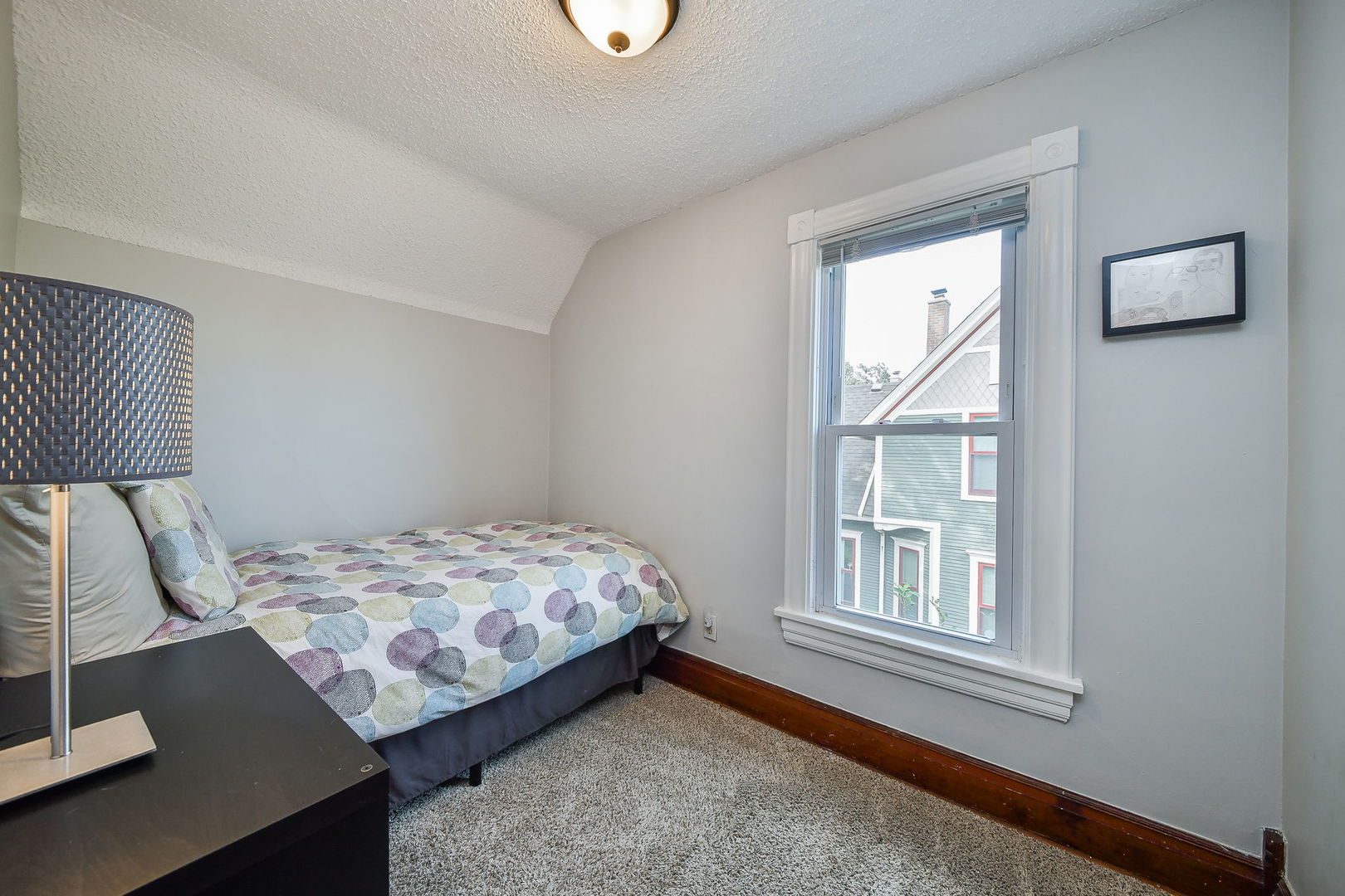 113 South 4th Street St. Charles, IL 60174 - Photo 18 of 32 a bedroom with a bed and a window