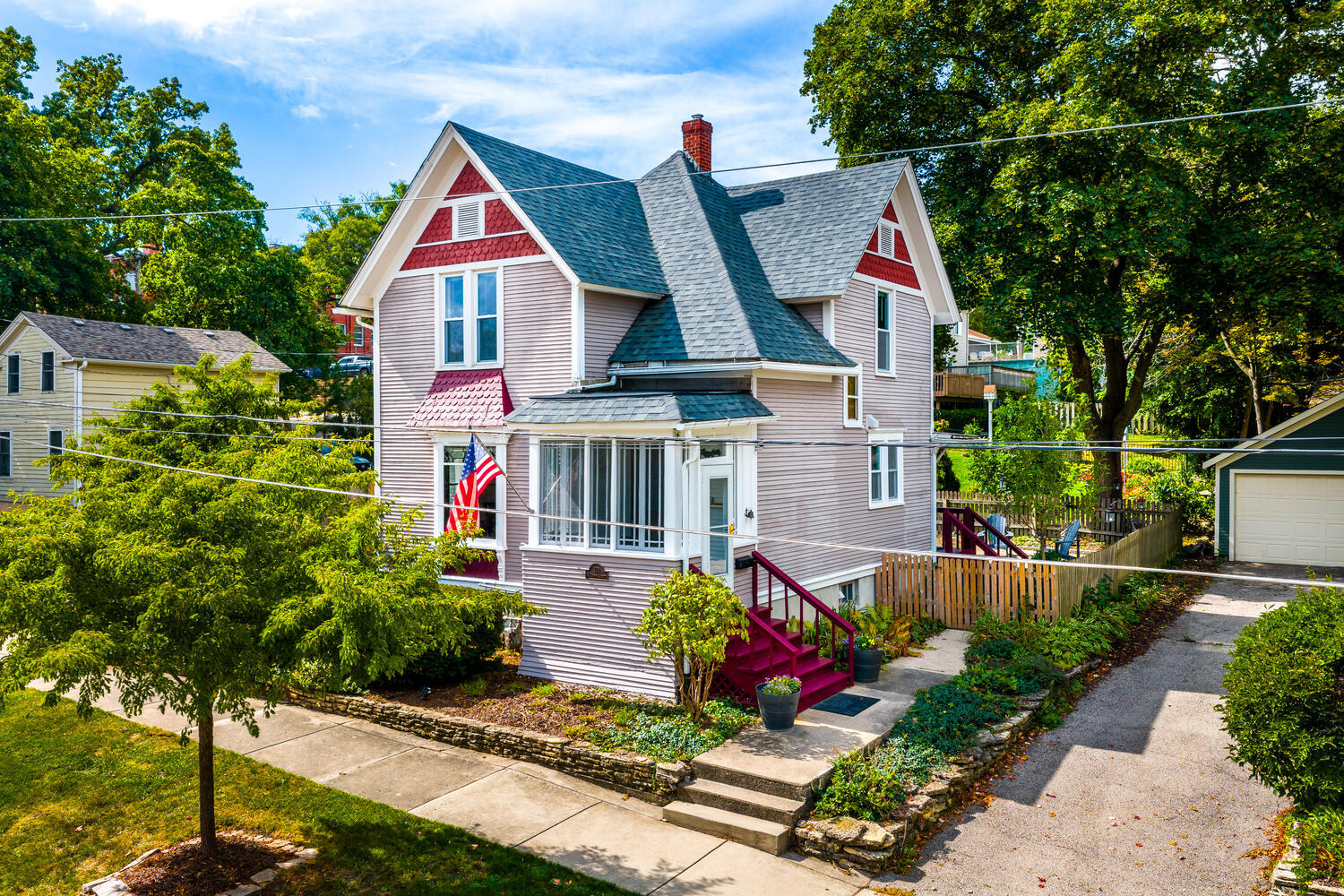 113 South 4th Street St. Charles, IL 60174 - Photo 22 of 32 a front view of a house with a yard