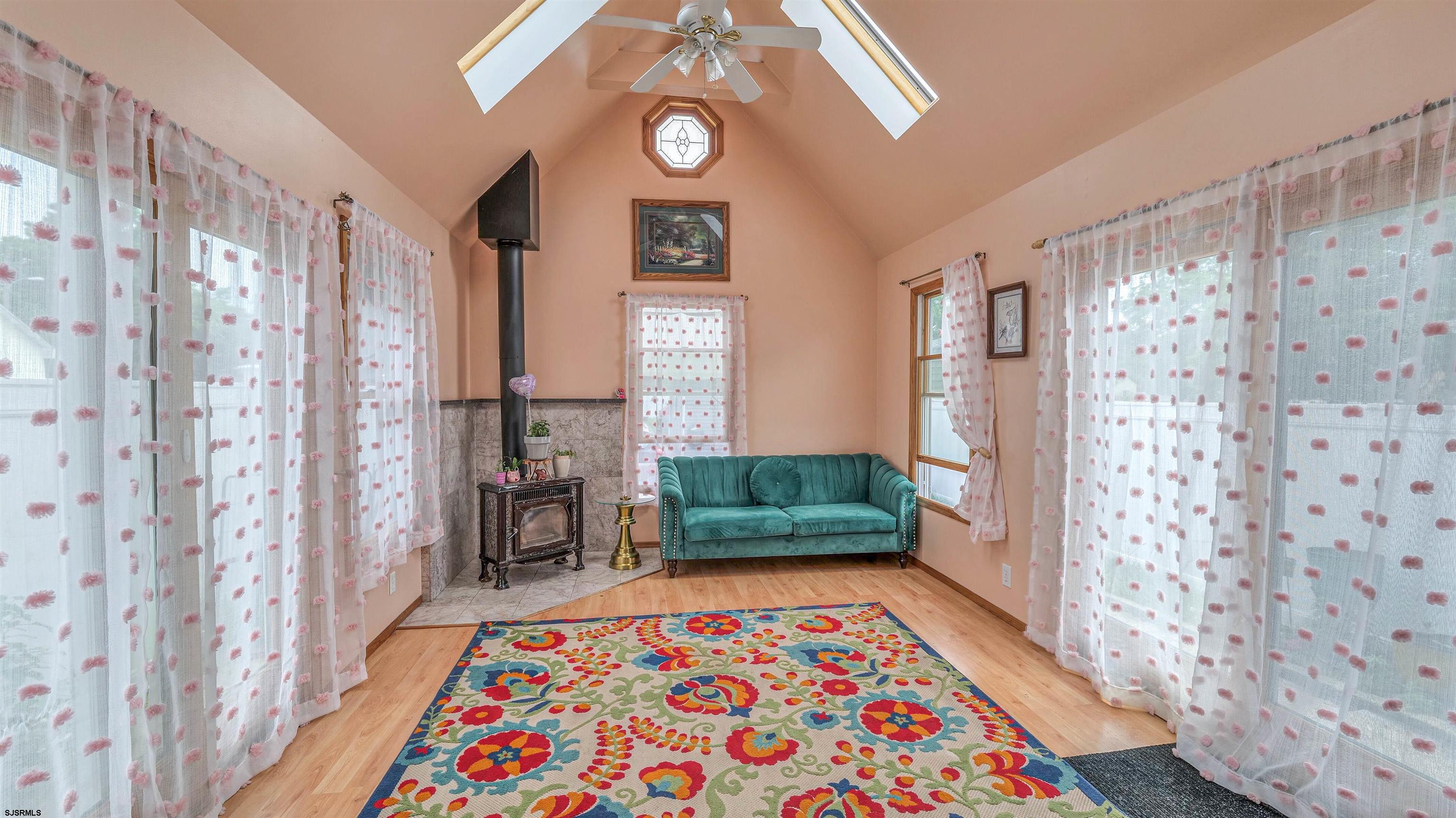 6015 Main Street Mays Landing, NJ 08330 - Photo 19 of 42 a bedroom with furniture and a rug
