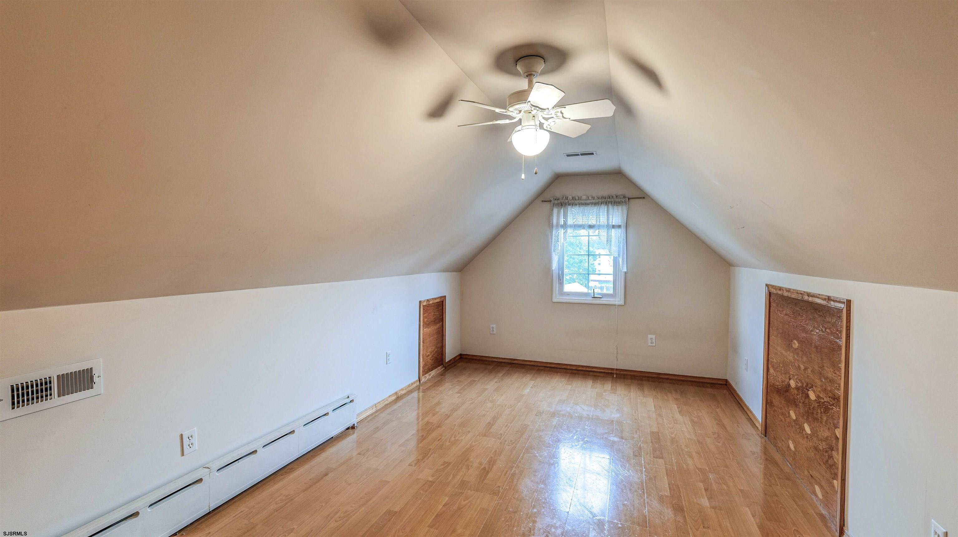 6015 Main Street Mays Landing, NJ 08330 - Photo 33 of 42 wooden floor in an empty room with a window