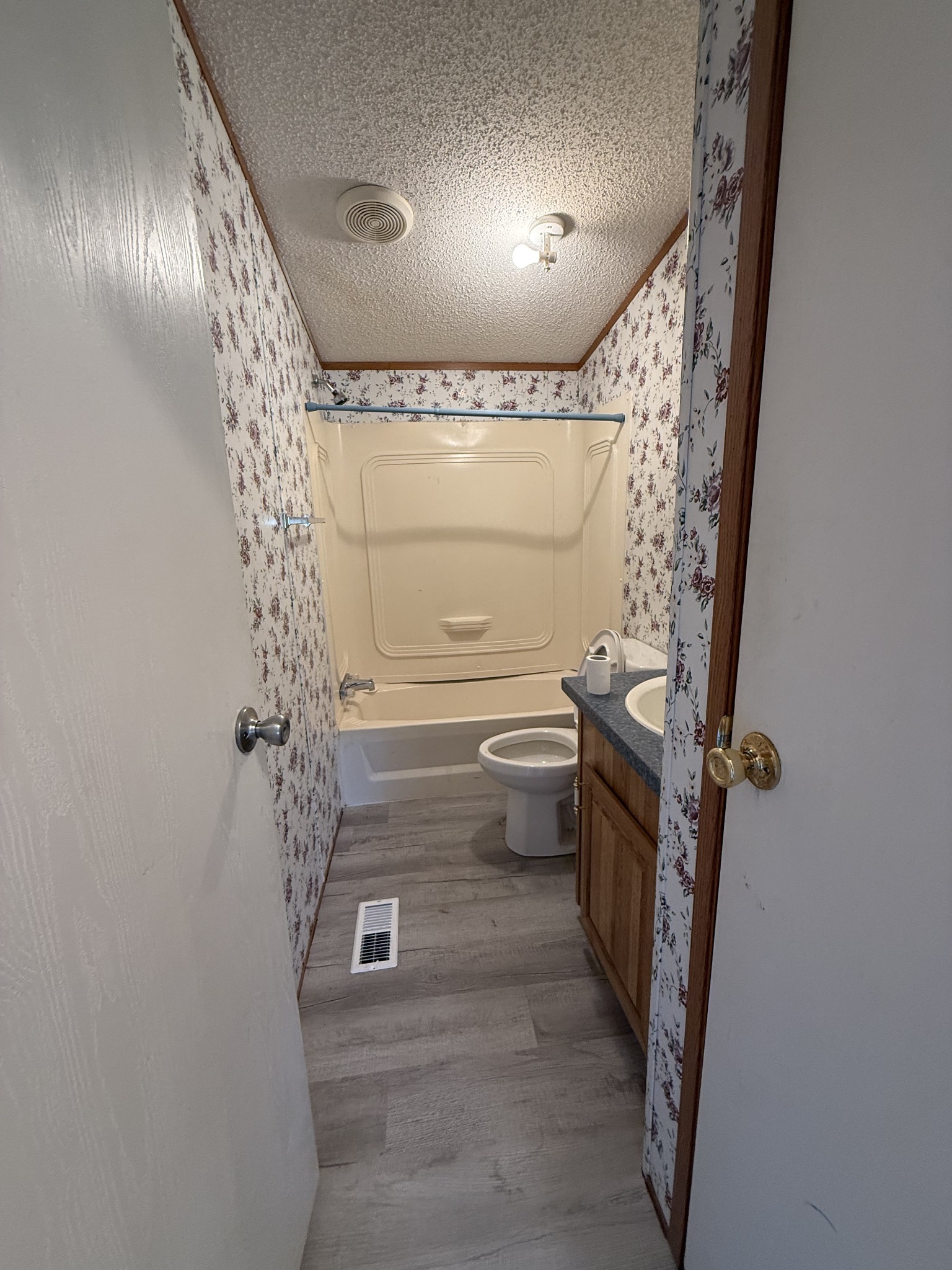 2421 Anes Station Road Lewisburg, TN 37091 - Photo 14 of 16 a bathroom with a shower toilet and sink