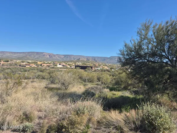 a view of a lake with mountains in the background