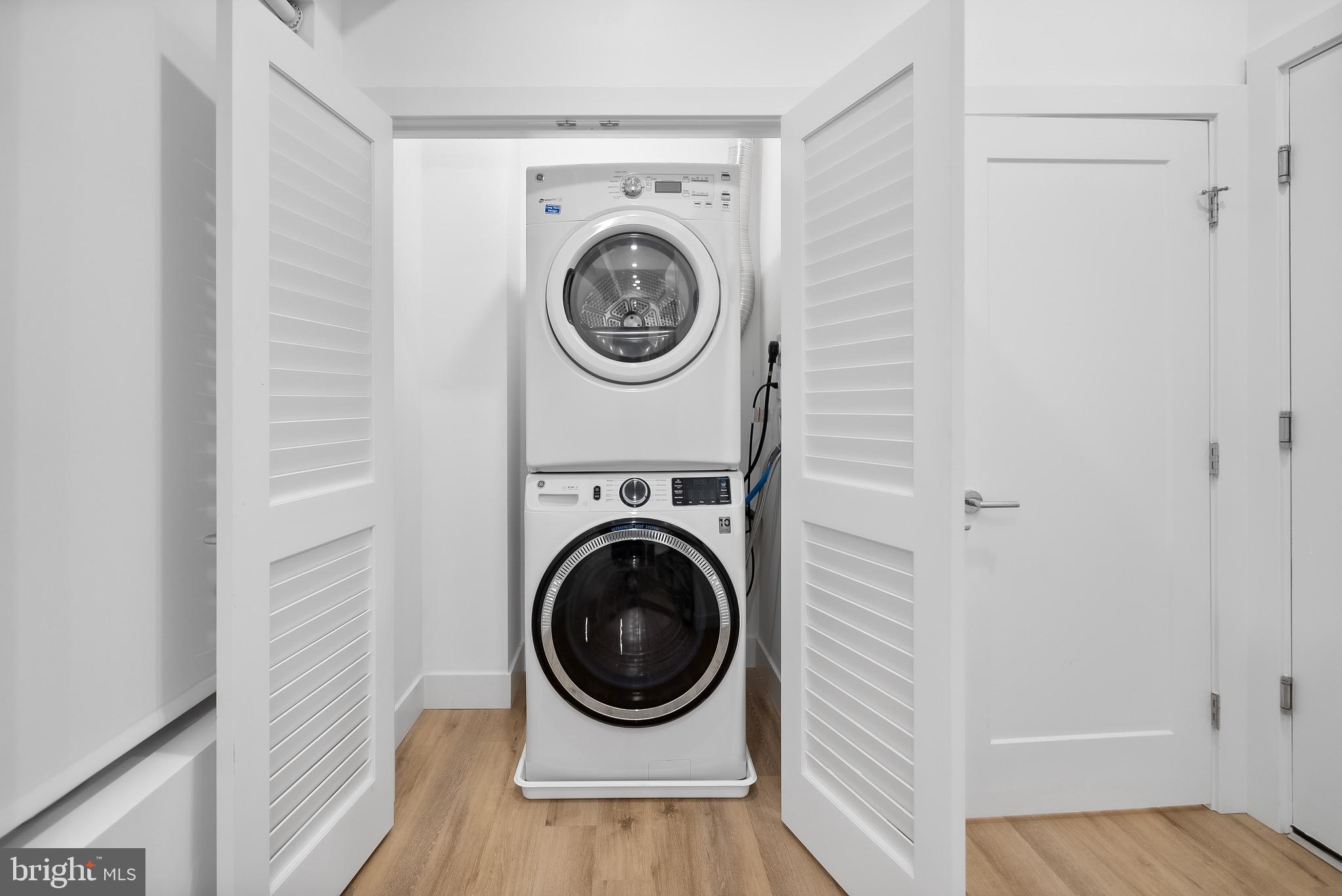 5230 Georgia Avenue Northwest, Unit 307 Washington, DC 20011 - Photo 11 of 15 a view of entryway with washer and dryer