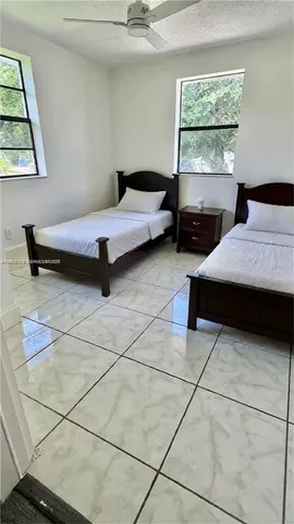 a view of an entryway with front door