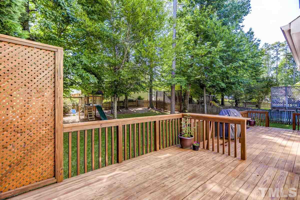 7934 Pine Timber Drive Raleigh, NC 27613 - Photo 18 of 22 a view of a wooden roof deck