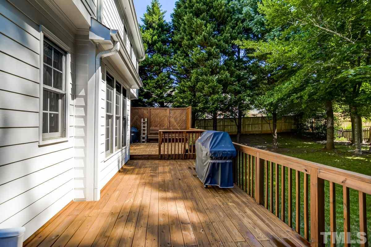 7934 Pine Timber Drive Raleigh, NC 27613 - Photo 19 of 22 a view of balcony with wooden floor and fence