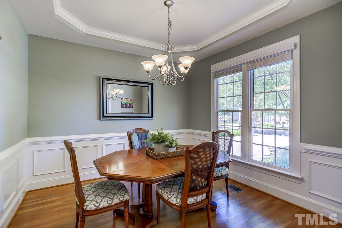 7934 Pine Timber Drive Raleigh, NC 27613 - Photo 5 of 22 a view of a dining room with furniture window and wooden floor